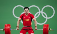 爱游戏:男子举重全锦赛收官 全运会“四冠王”杨哲夺两金